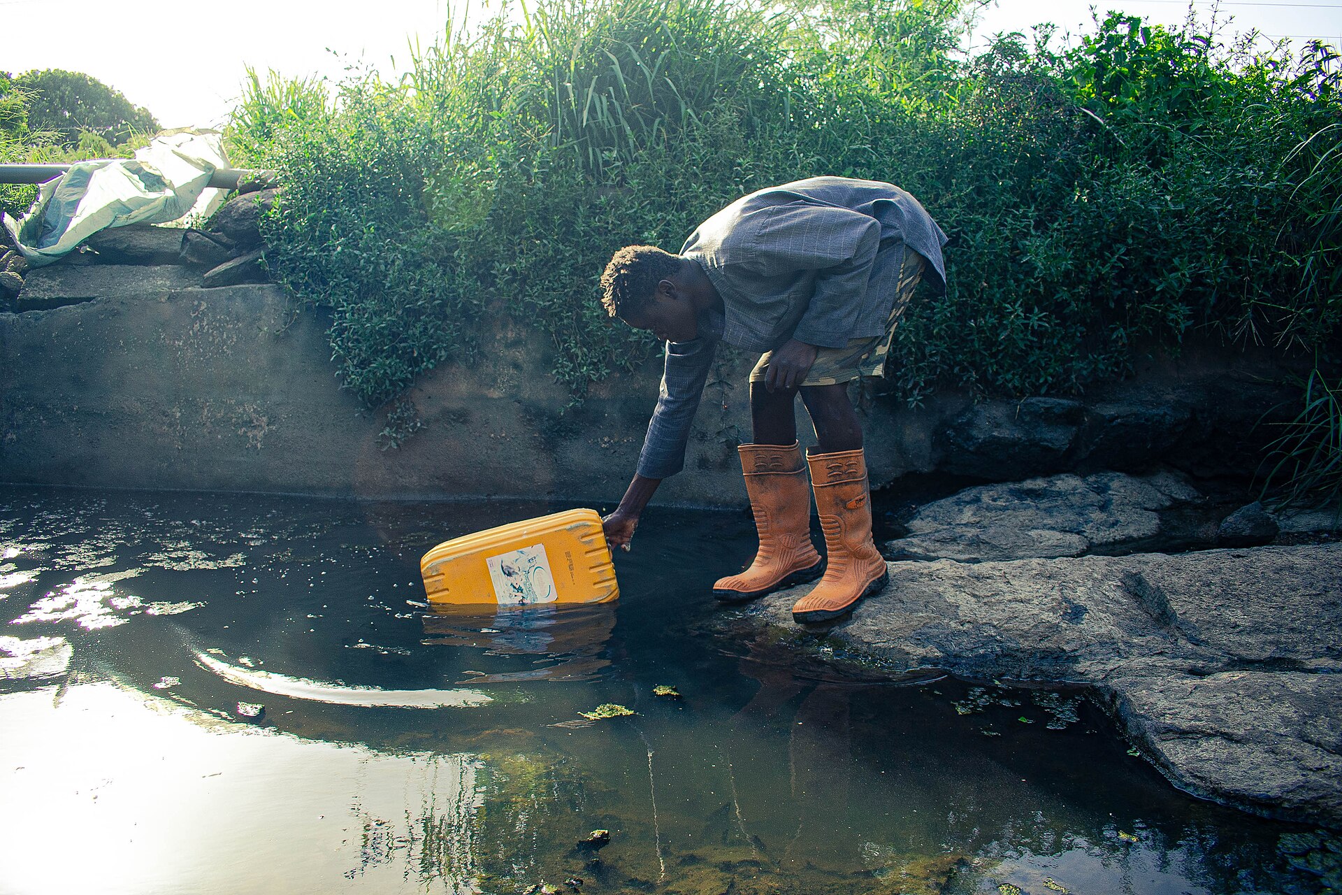A farmer selling produce in Ghana.