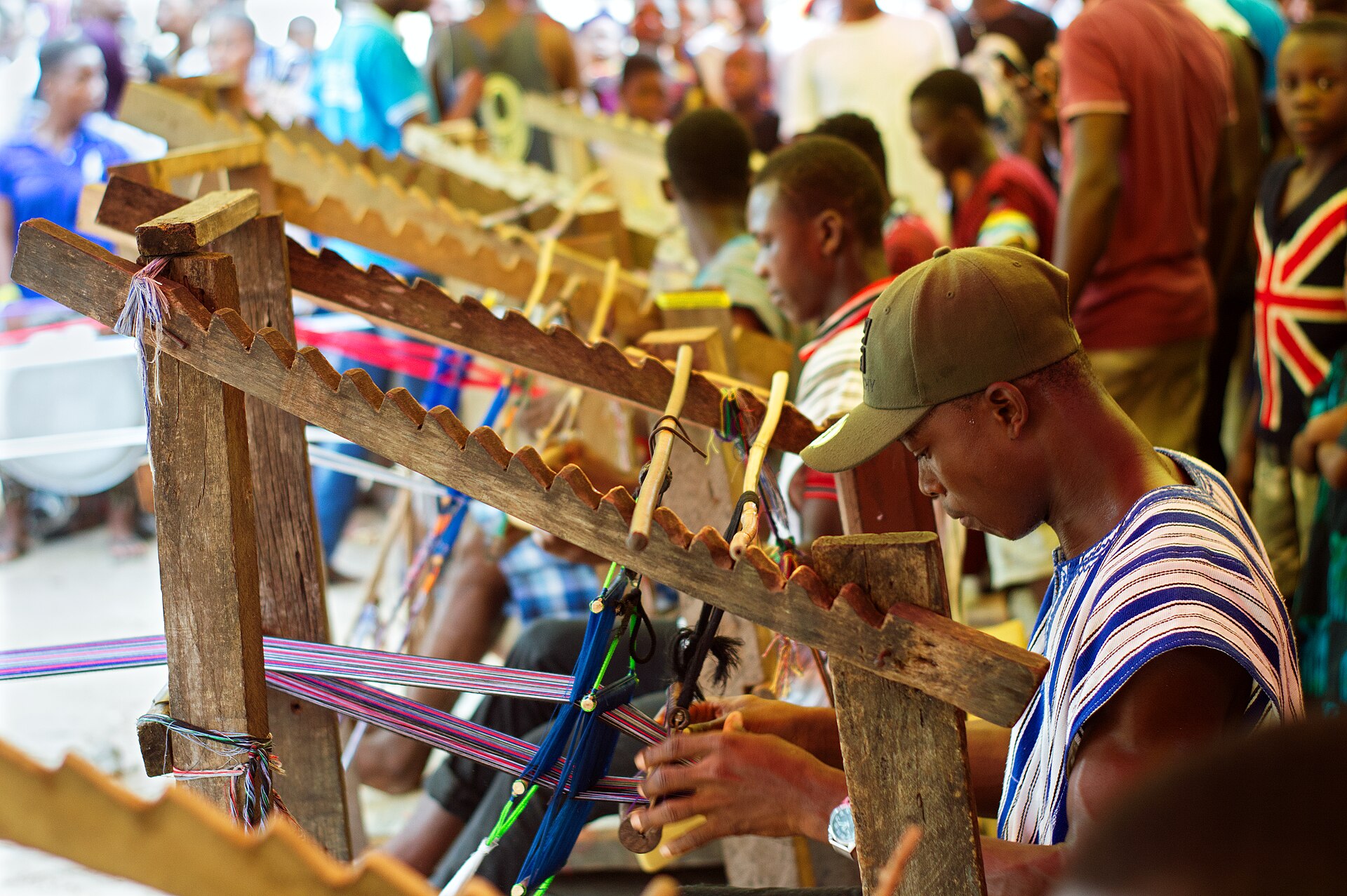 A kente weaver at work in Ghana.